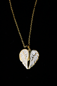 Charger l'image dans la visionneuse de la galerie, Collier cœur caché à ailes étincelantes
