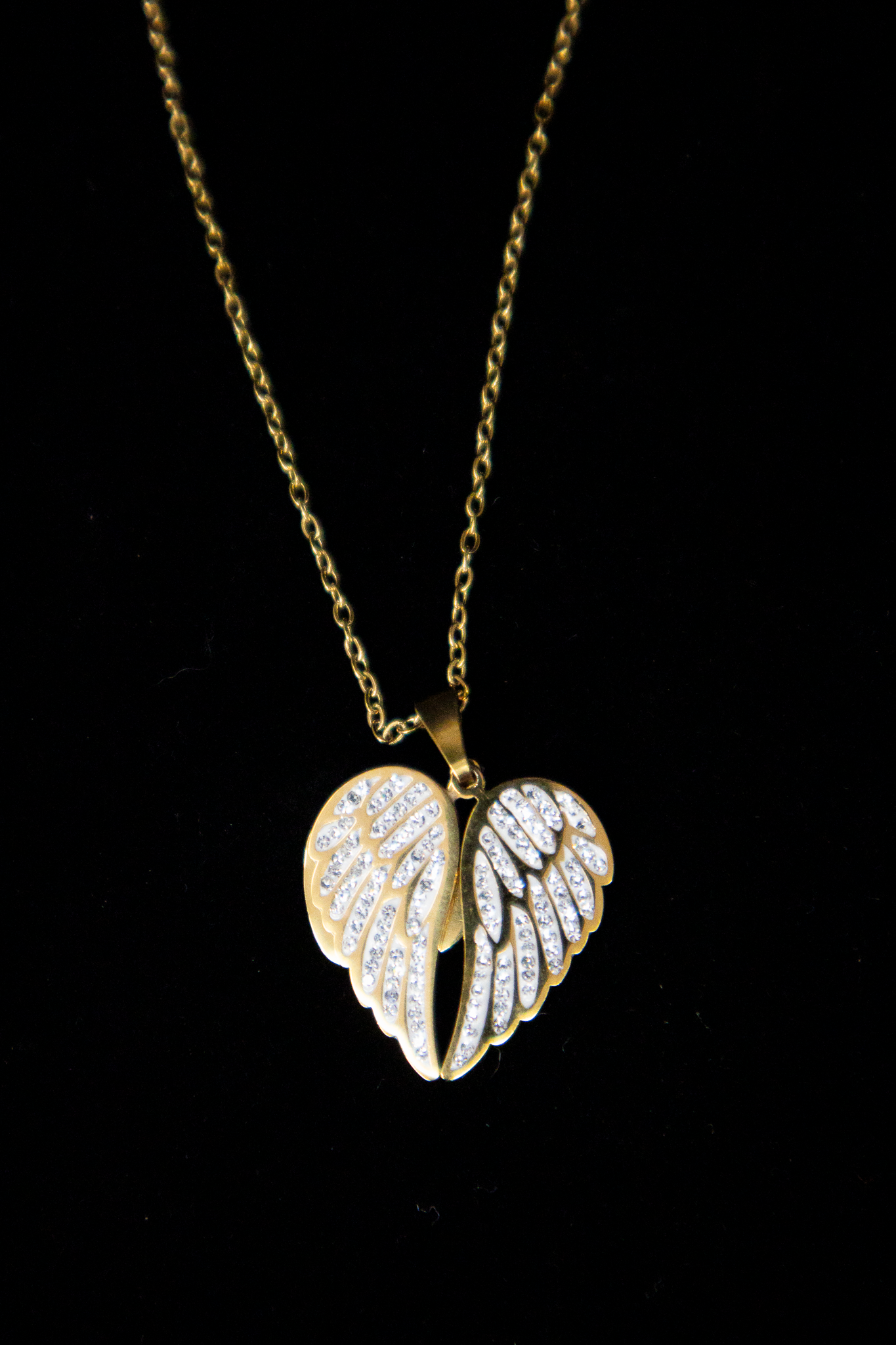 Collier cœur caché à ailes étincelantes